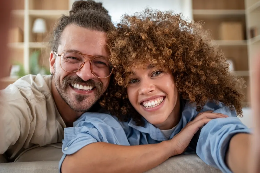 A patient reading dental FAQs